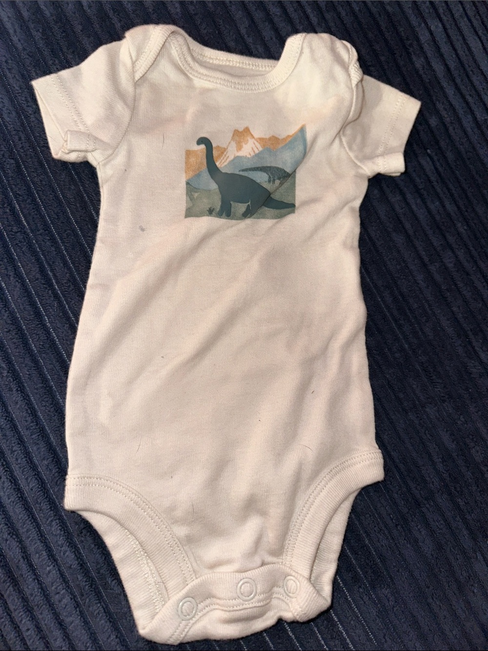 Carter's White One-Piece Bodysuit with Blue Dinosaur Graphic